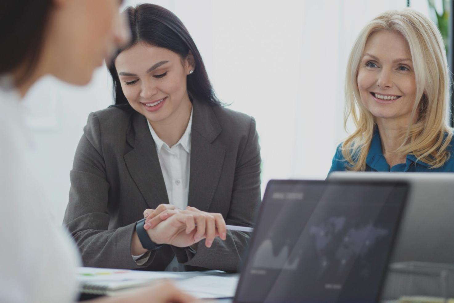 Professional UX designer presenting design solutions to a client team